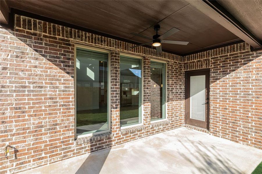 Exterior details and patio area of a home in West Crossing, Anna (Image 4). Exterior details and patio area of a home in West Crossing, Anna (Image 4).