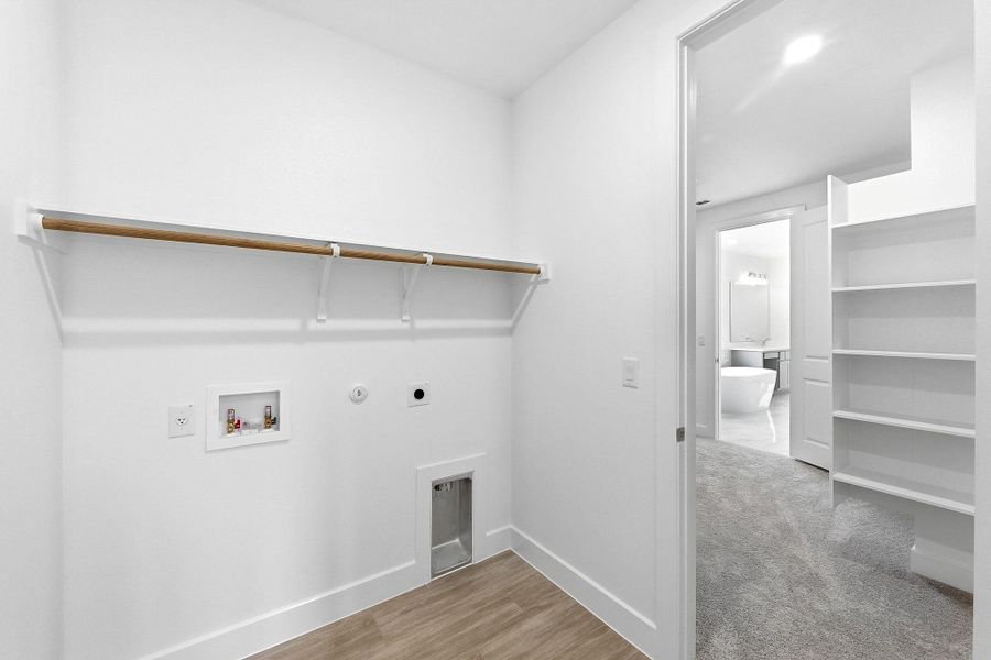 Spacious, unfurnished interior of a new home in The Colony, Bastrop (Image 39).