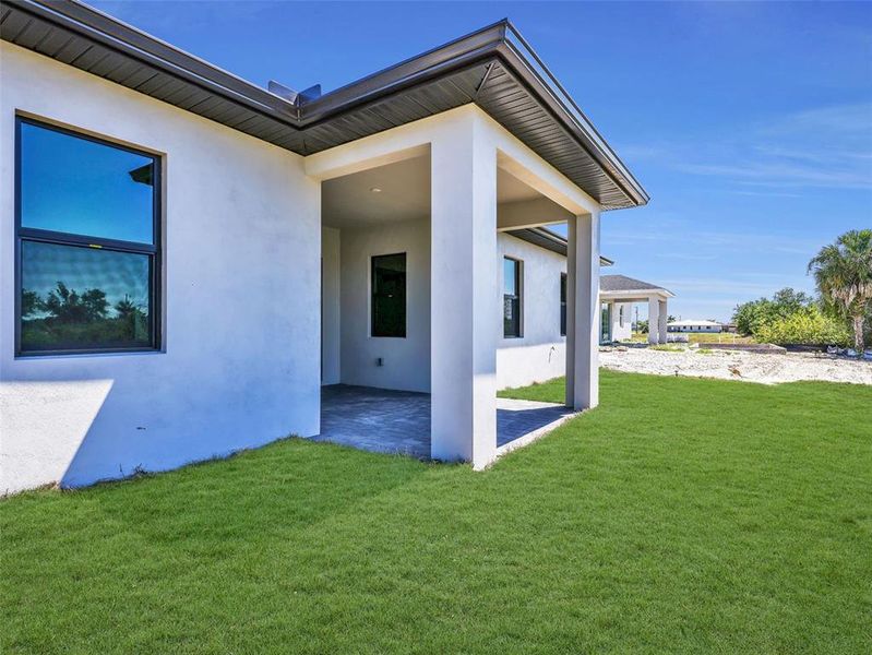 Exterior details and patio area of a home in , Cape Coral (Image 25).