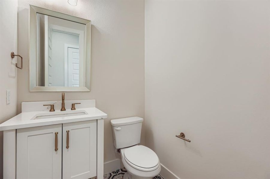 Bathroom with vanity and toilet