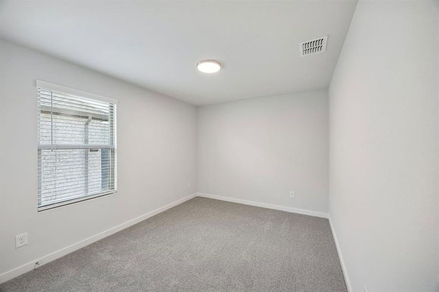 Bedroom in the Oak II home plan by Trophy Signature Homes – REPRESENTATIVE PHOTO Bedroom in the Oak II home plan by Trophy Signature Homes – REPRESENTATIVE PHOTO