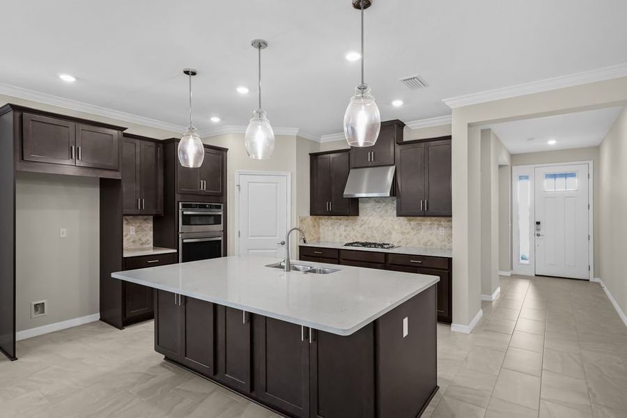 Furnished interior view inside a new home in Veranda Oaks, Port St. Lucie (Image 7).