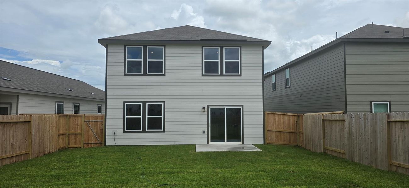 Exterior details and patio area of a home in Vacek Pointe, Richmond (Image 3).