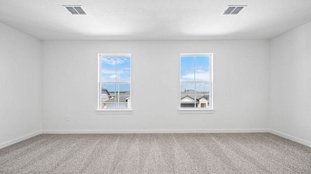 Spacious, unfurnished interior of a new home in Rosenbusch Ranch, Leander (Image 29).