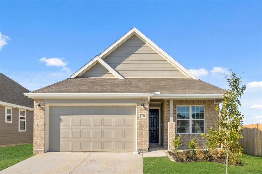 Front exterior of a new home in Retreat at Fossil Creek, Fort Worth, TX, highlighting curb appeal (Image 1). Front exterior of a new home in Retreat at Fossil Creek, Fort Worth, TX, highlighting curb appeal (Image 1).