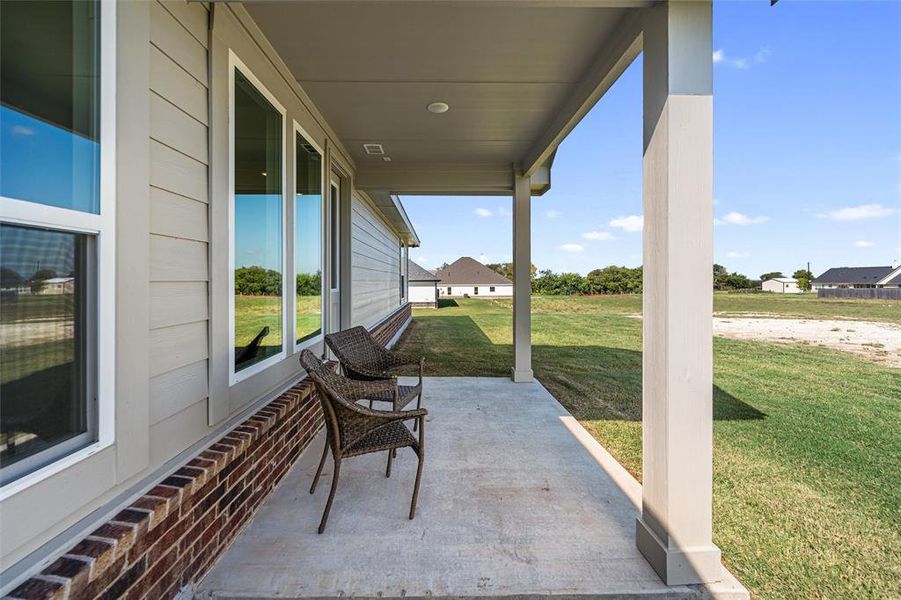 Exterior details and patio area of a home in Nash Estates, Tom Bean (Image 25).