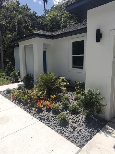 Exterior details and patio area of a home in , New Smyrna Beach (Image 17).