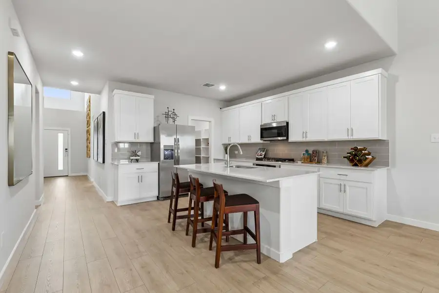 Kitchen in a Madero Winters Model Home in Haslet TX by Trophy Signature Homes
