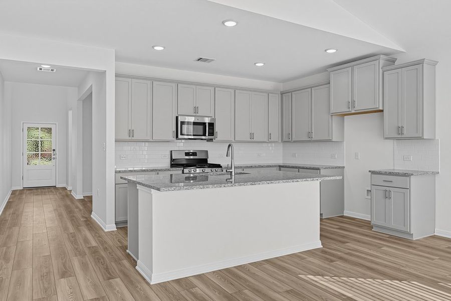 Representative furnished interior of a home built from the Warbler by Taylor Morrison in Longview, Del Valle (Image 3).