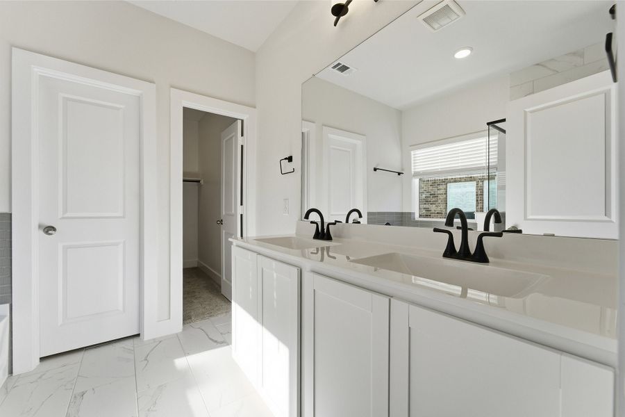Furnished interior view inside a new home in Sagebrook, Argyle (Image 11). Furnished interior view inside a new home in Sagebrook, Argyle (Image 11).