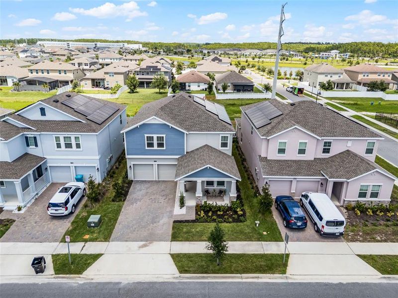 Front exterior of a new home in , Orlando, FL, highlighting curb appeal (Image 23).