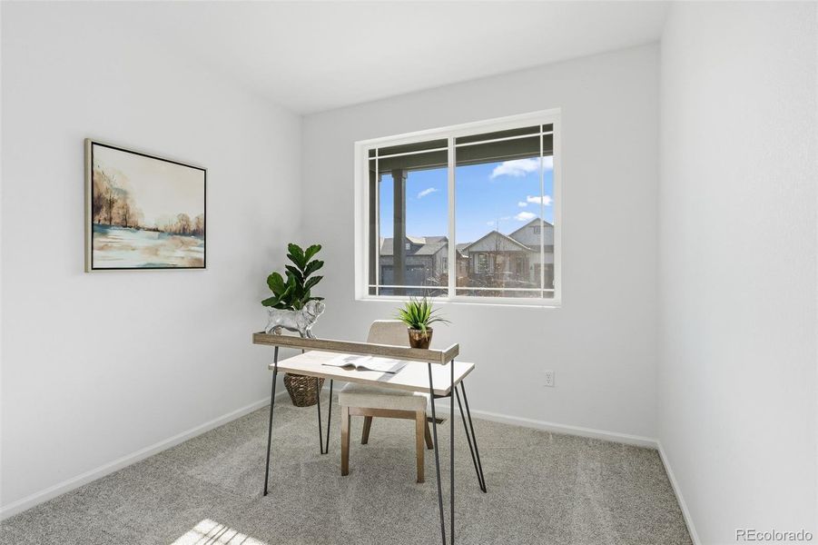 Furnished interior view inside a new home in The Cottages Collection at Ridgeline Vista, Brighton (Image 10).
