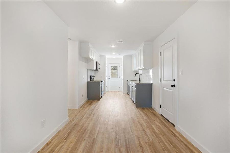 Spacious, unfurnished interior of a new home in Miller Street Cottages, Denison (Image 10).