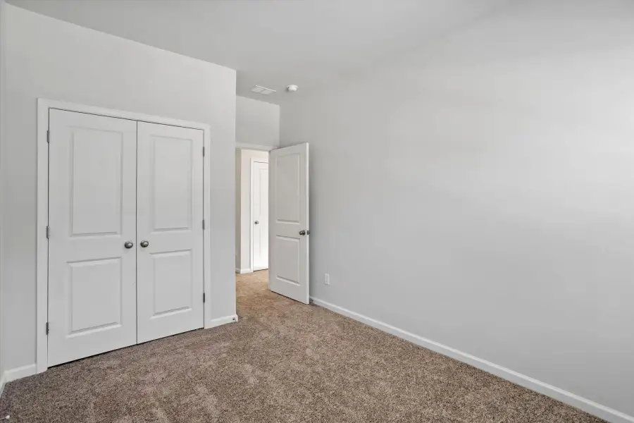Spacious, unfurnished interior of a new home in West Main Townhomes, Sanford (Image 19).