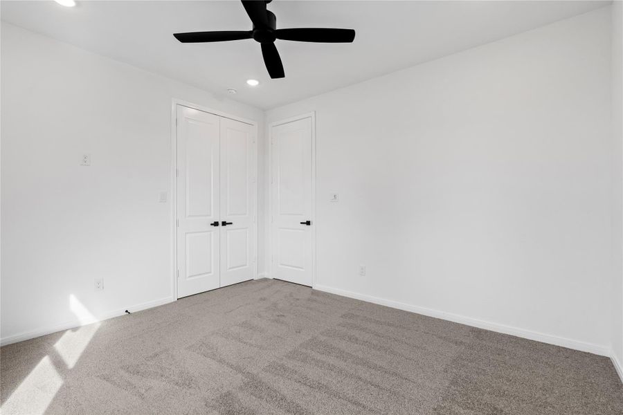 Flexible upstairs bedrooms offering comfort and function for everyday living.