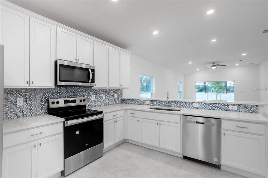 Furnished interior view inside a new home in , Port Charlotte (Image 9). Furnished interior view inside a new home in , Port Charlotte (Image 9).