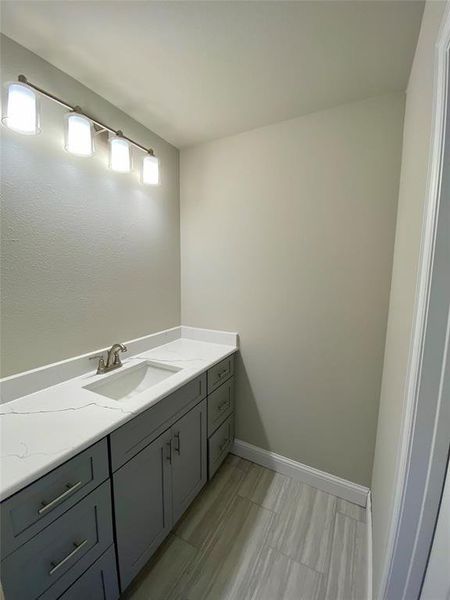 Bath #3 has a private, separate vanity off of upstairs bedroom #4.