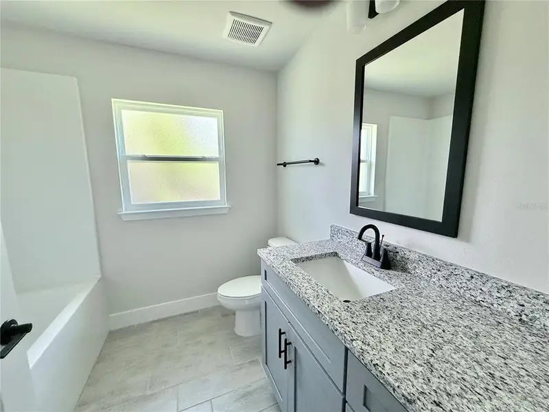 Furnished interior view inside a new home in Port Charlotte, Port Charlotte (Image 7).