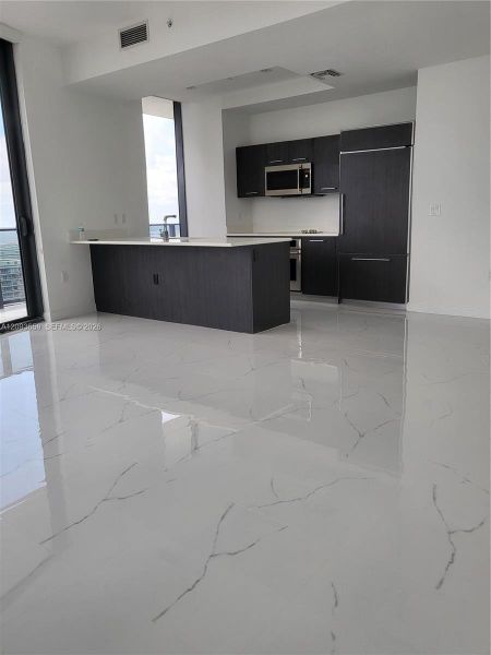 Spacious, unfurnished interior of a new home in , Miami (Image 2). Spacious, unfurnished interior of a new home in , Miami (Image 2).