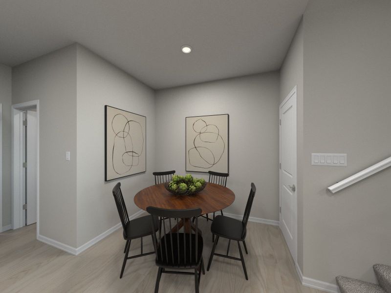 Dining area in the Bloomfield floorplan at a Meritage Homes community in Zebulon, NC.