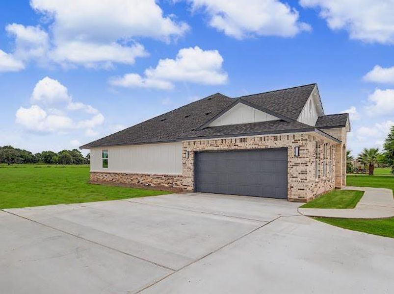 Front exterior of a new home in , Angleton, TX, highlighting curb appeal (Image 17).