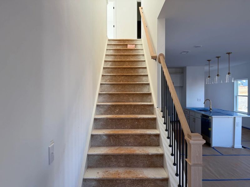 Staircase featuring the AW Collection® Serene - Clean lines and quiet tones lead the way.