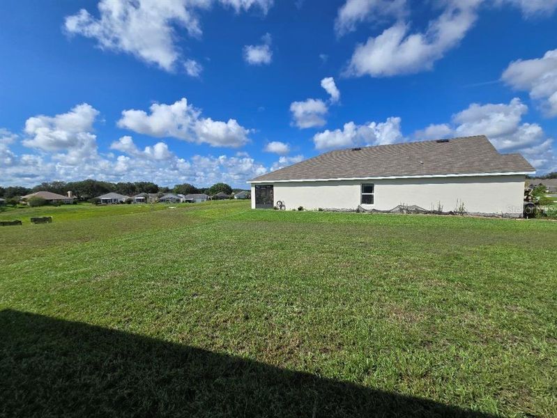 Front exterior of a new home in Twisted Oaks, Beverly Hills, FL, highlighting curb appeal (Image 18).