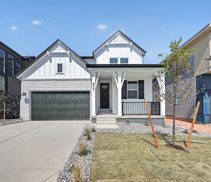 Front exterior of a new home in Sterling Ranch Ascent Village, Littleton, CO, highlighting curb appeal (Image 1). Front exterior of a new home in Sterling Ranch Ascent Village, Littleton, CO, highlighting curb appeal (Image 1).