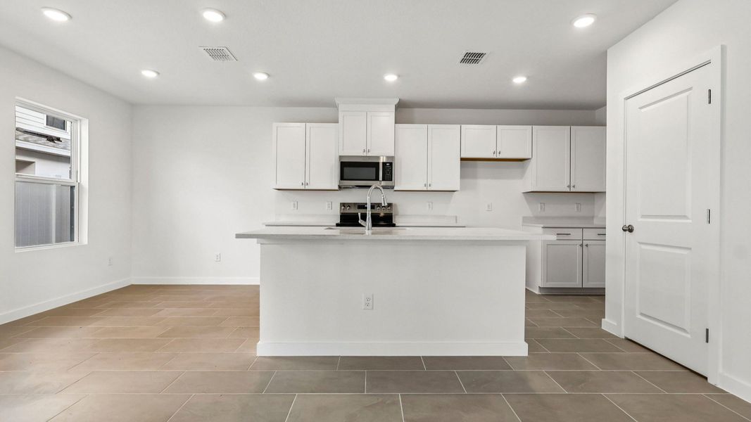 Furnished interior view inside a new home in Cyrene at Harmony, St. Cloud (Image 11).