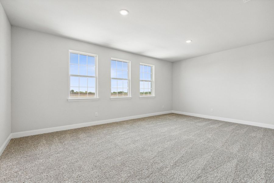 Representative unfurnished interior of a home built from the Lyla by Megatel Homes in Santorini, Seagoville (Image 12).