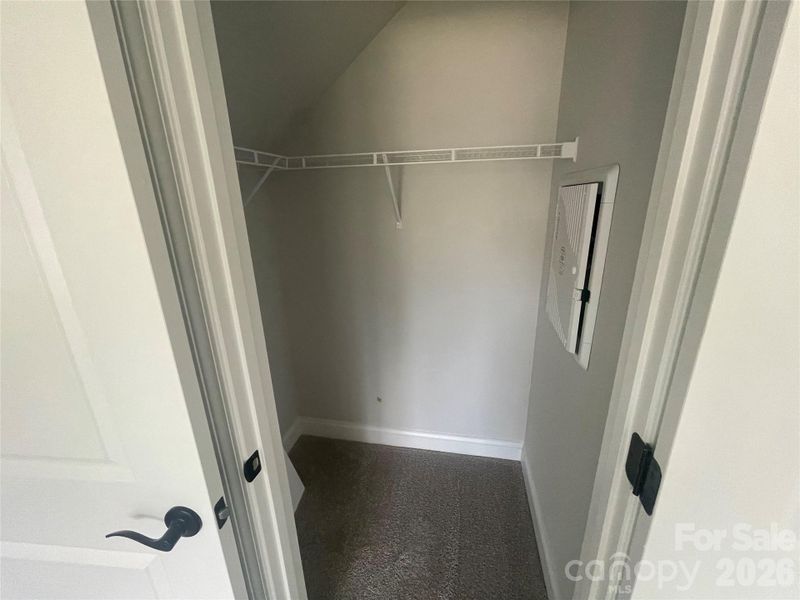 First floor guest suite walk in closet