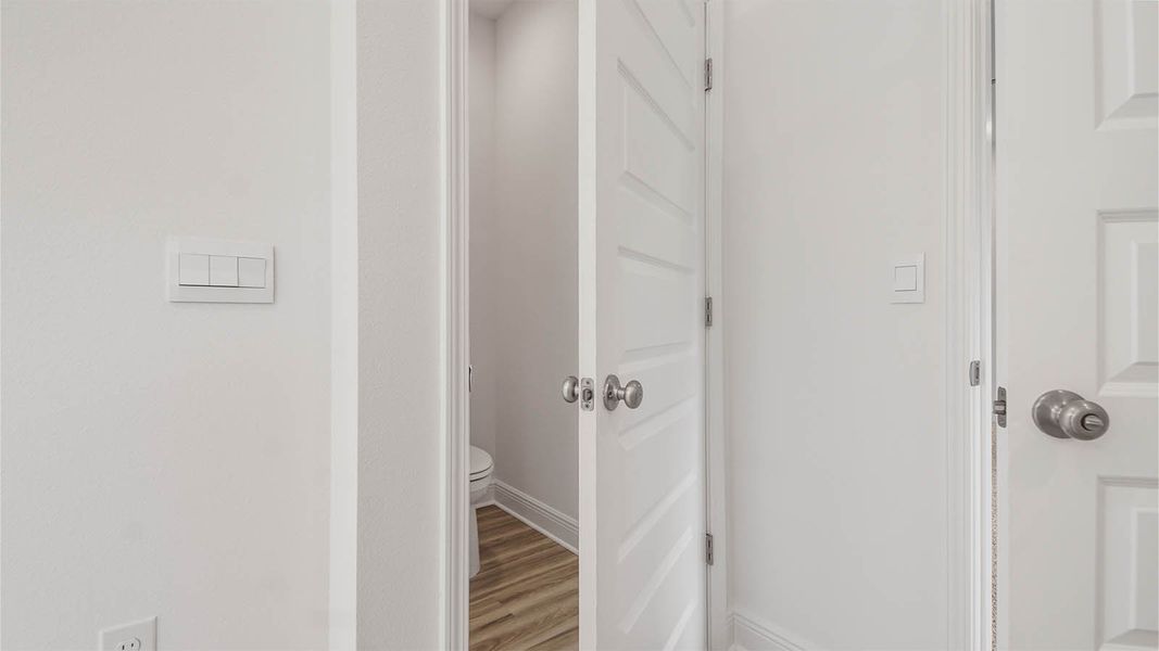 Representative unfurnished interior of a home built from the Kennedy by D.R. Horton in Bayside at Ward Creek, Panama City Beach (Image 28).