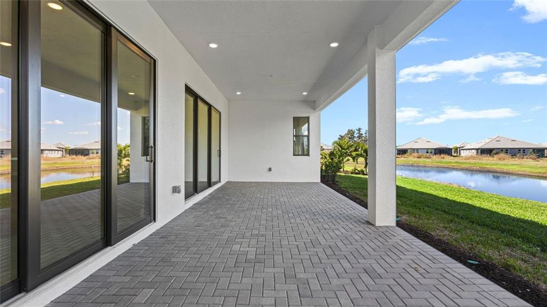 Exterior details and patio area of a home in Cresswind Lakewood Ranch, Lakewood Ranch (Image 3).