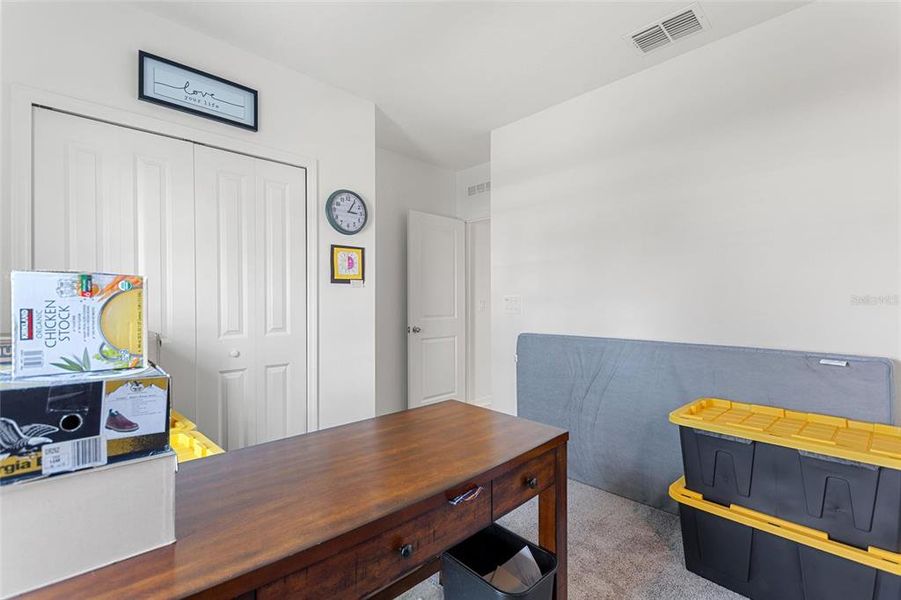 Furnished interior view inside a new home in Lawson Dunes: Estate Collection, Haines City (Image 27).