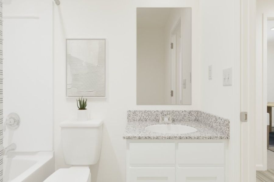 A bathroom with a sink and a toilet. A bathroom with a sink and a toilet.