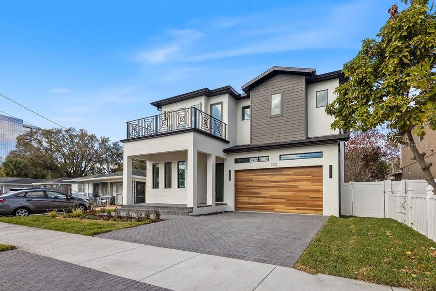 Front exterior of a new home in , Tampa, FL, highlighting curb appeal (Image 2). Front exterior of a new home in , Tampa, FL, highlighting curb appeal (Image 2).