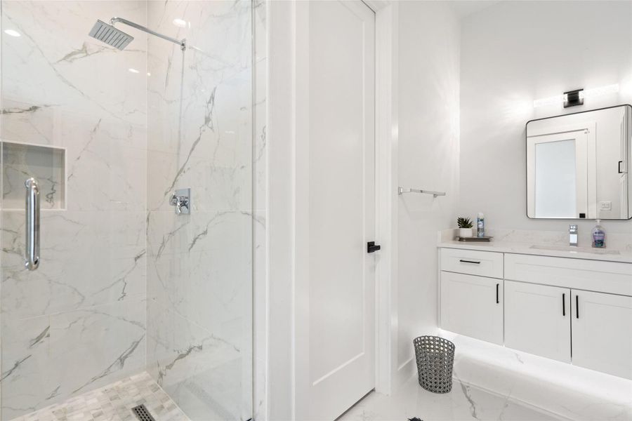 . Three additional ensuite bedrooms provide generous accommodations for family and guests alike.