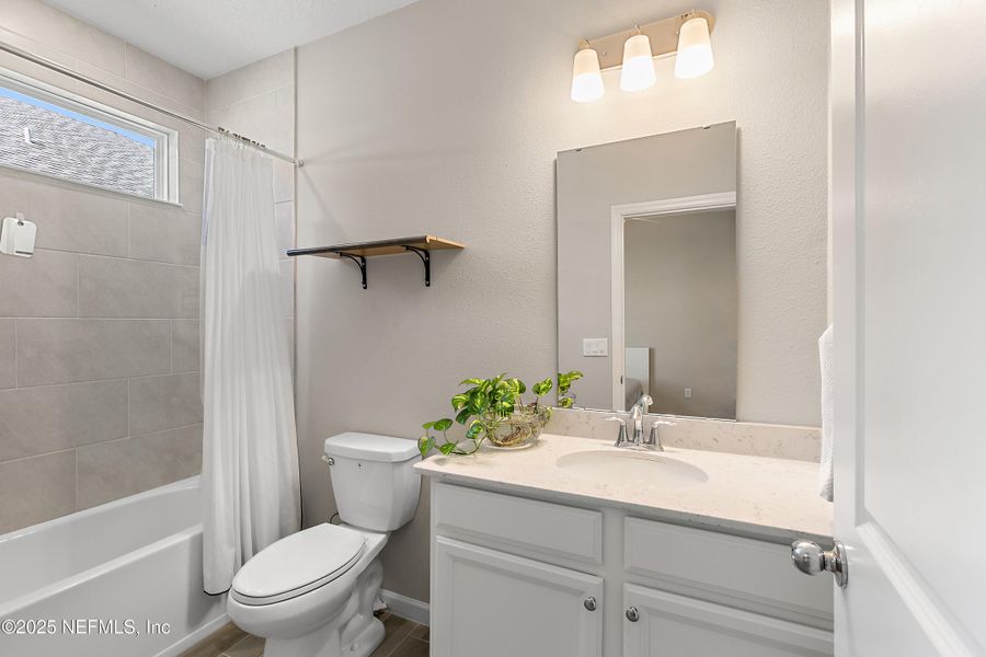 Furnished interior view inside a new home in Gentle Woods North, Jacksonville (Image 14).