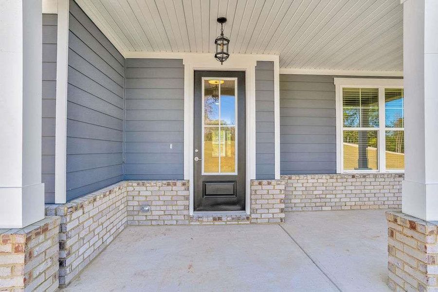 Exterior details and patio area of a home in Waters Edge, Mansfield (Image 17). Exterior details and patio area of a home in Waters Edge, Mansfield (Image 17).