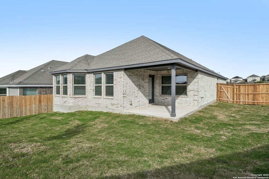 Exterior details and patio area of a home in Arcadia Ridge - Premier Series, San Antonio (Image 4). Exterior details and patio area of a home in Arcadia Ridge - Premier Series, San Antonio (Image 4).