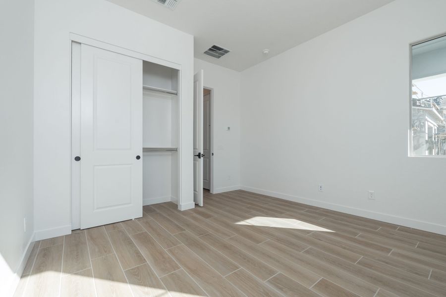 Spacious, unfurnished interior of a new home in Waterston Central, Gilbert (Image 14).
