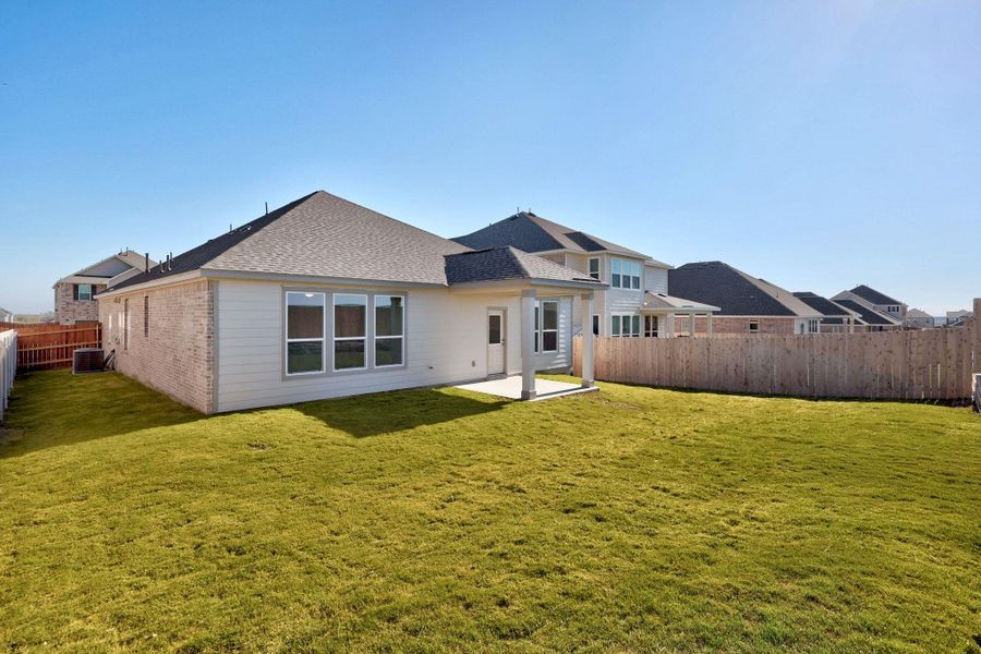 Exterior details and patio area of a home in Salerno - Classic Collection, Round Rock (Image 3). Exterior details and patio area of a home in Salerno - Classic Collection, Round Rock (Image 3).