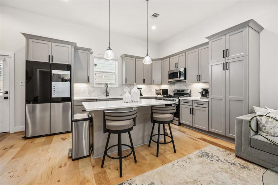 Plenty of room to entertain in this spacious kitchen which includes a Smart Refrigerator with AI Vision!