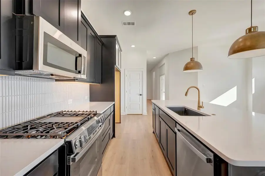 Furnished interior view inside a new home in Creekshaw – Classic, Royse City (Image 6).