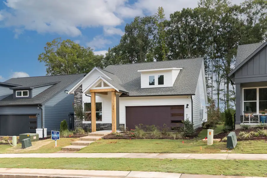Front exterior of a new home in Encore at Chatham Park – Classic Series, Pittsboro, NC, highlighting curb appeal (Image 1). Front exterior of a new home in Encore at Chatham Park – Classic Series, Pittsboro, NC, highlighting curb appeal (Image 1).