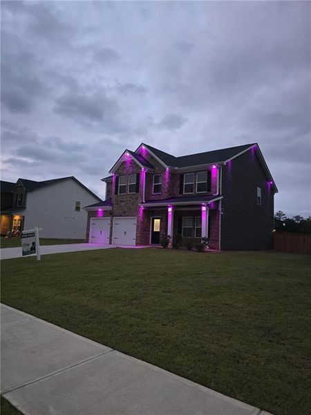 Front exterior of a new home in Fern Dale, Fairburn, GA, highlighting curb appeal (Image 34).
