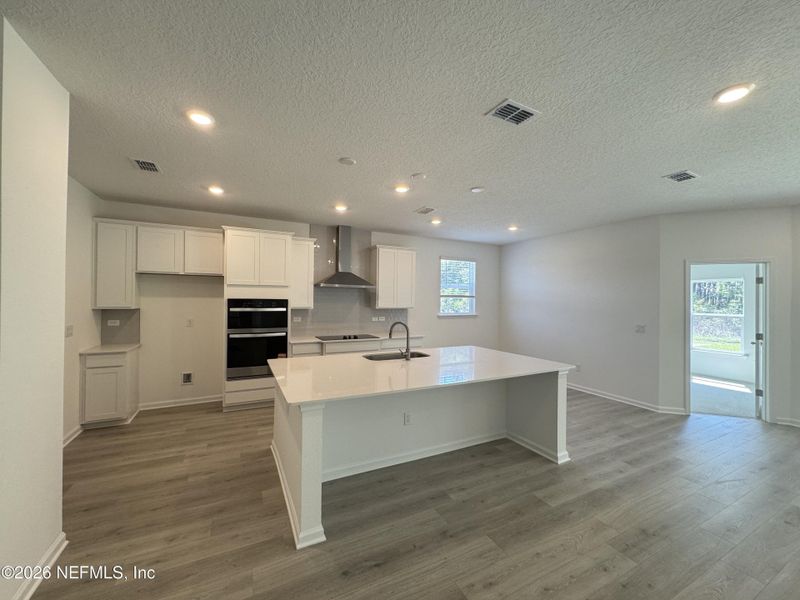 Furnished interior view inside a new home in Hyland Trail, Green Cove Springs (Image 7).
