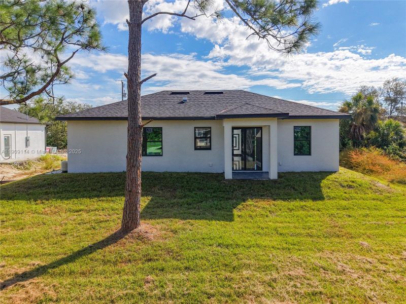 Exterior details and patio area of a home in , Lehigh Acres (Image 26).