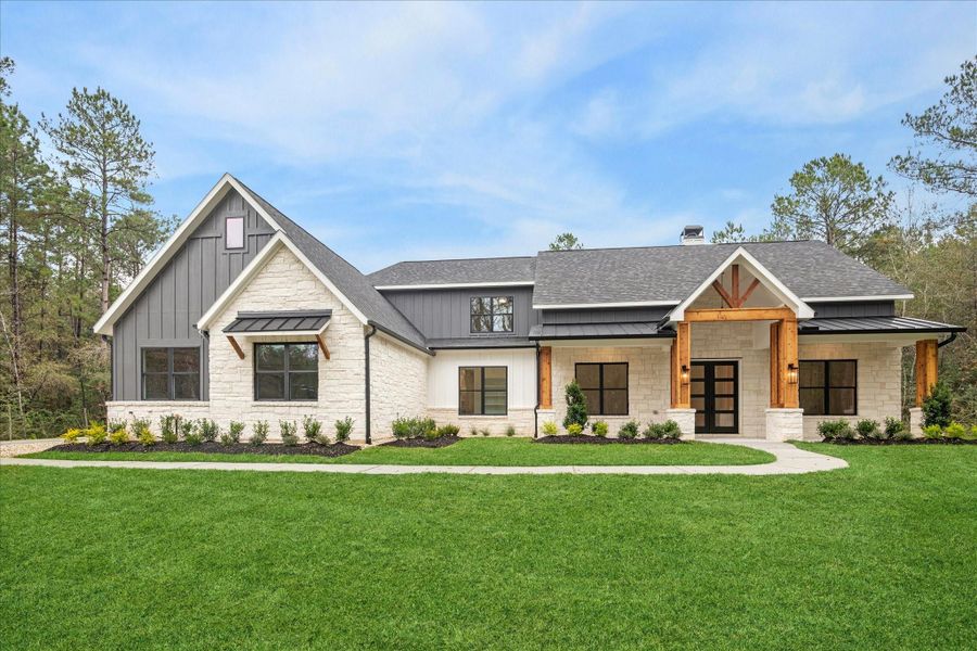 Front exterior of a new home in , Huntsville, TX, highlighting curb appeal (Image 21). Front exterior of a new home in , Huntsville, TX, highlighting curb appeal (Image 21).