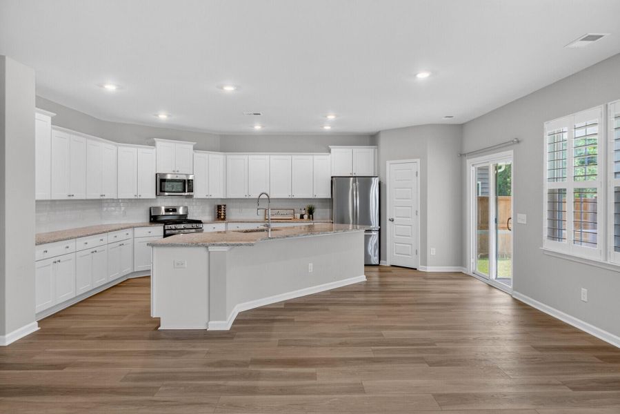 Furnished interior view inside a new home in Lindera Preserve at Cane Bay Plantation, Summerville (Image 9).